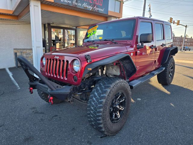 2013 Jeep Wrangler Unlimited Sahara Sport Utility 4d - Image 2